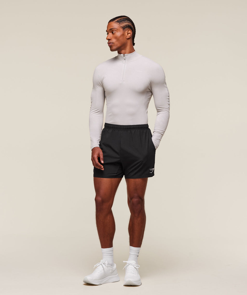 gymshark-everywear-warp-knit-polo-1-4-zip-ls-tops-grey-ss24
