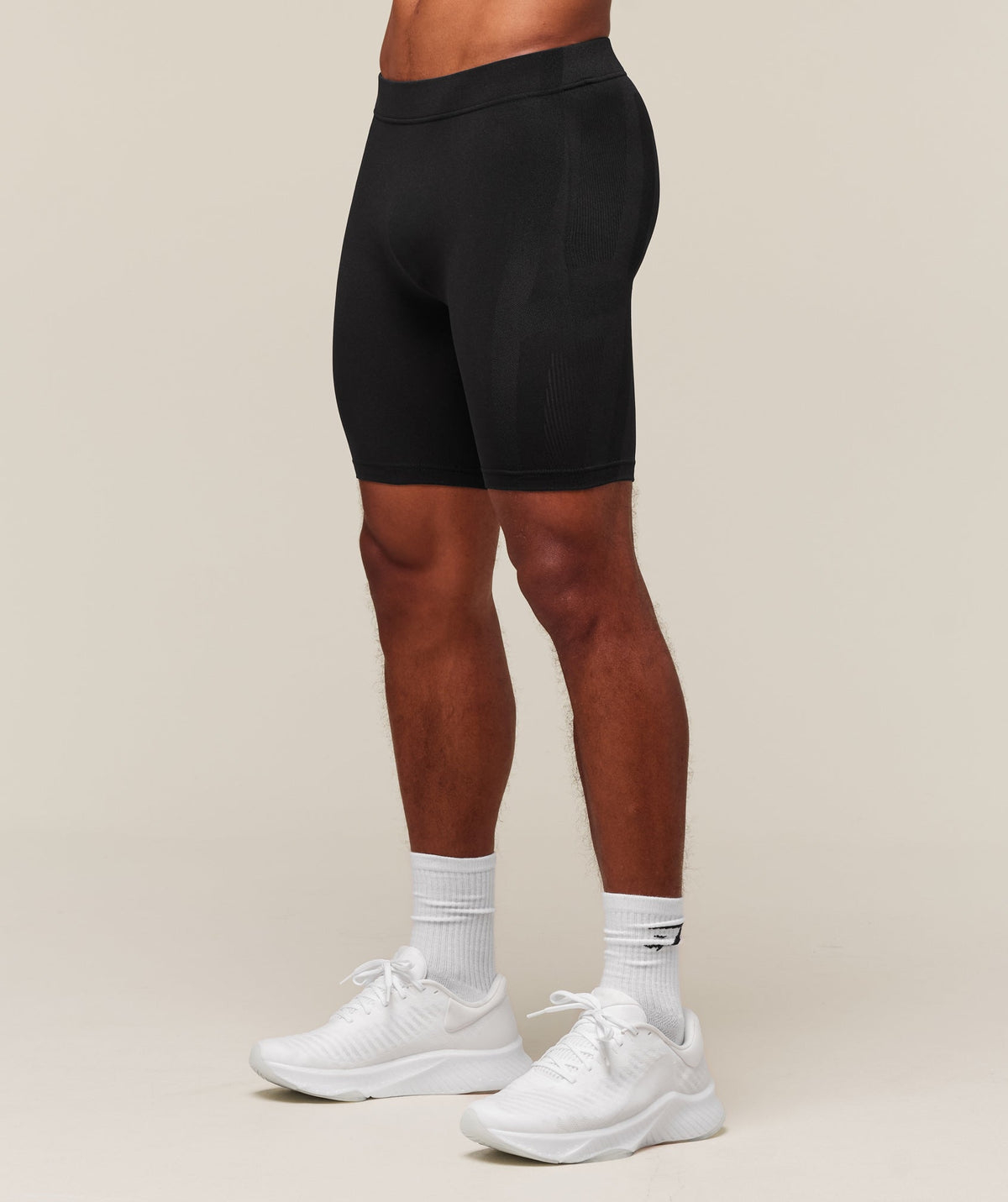 gymshark-everywear-warp-knit-half-tight-shorts-black-ss24