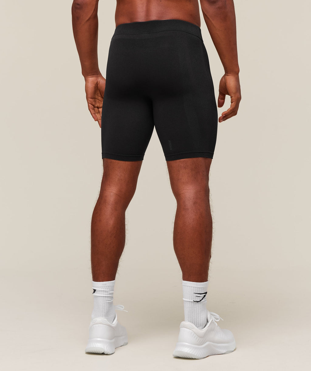 gymshark-everywear-warp-knit-half-tight-shorts-black-ss24