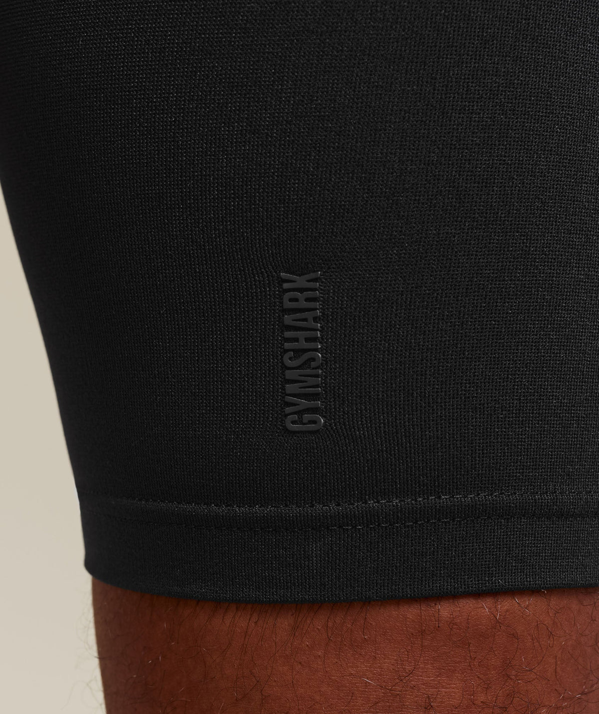 gymshark-everywear-warp-knit-half-tight-shorts-black-ss24