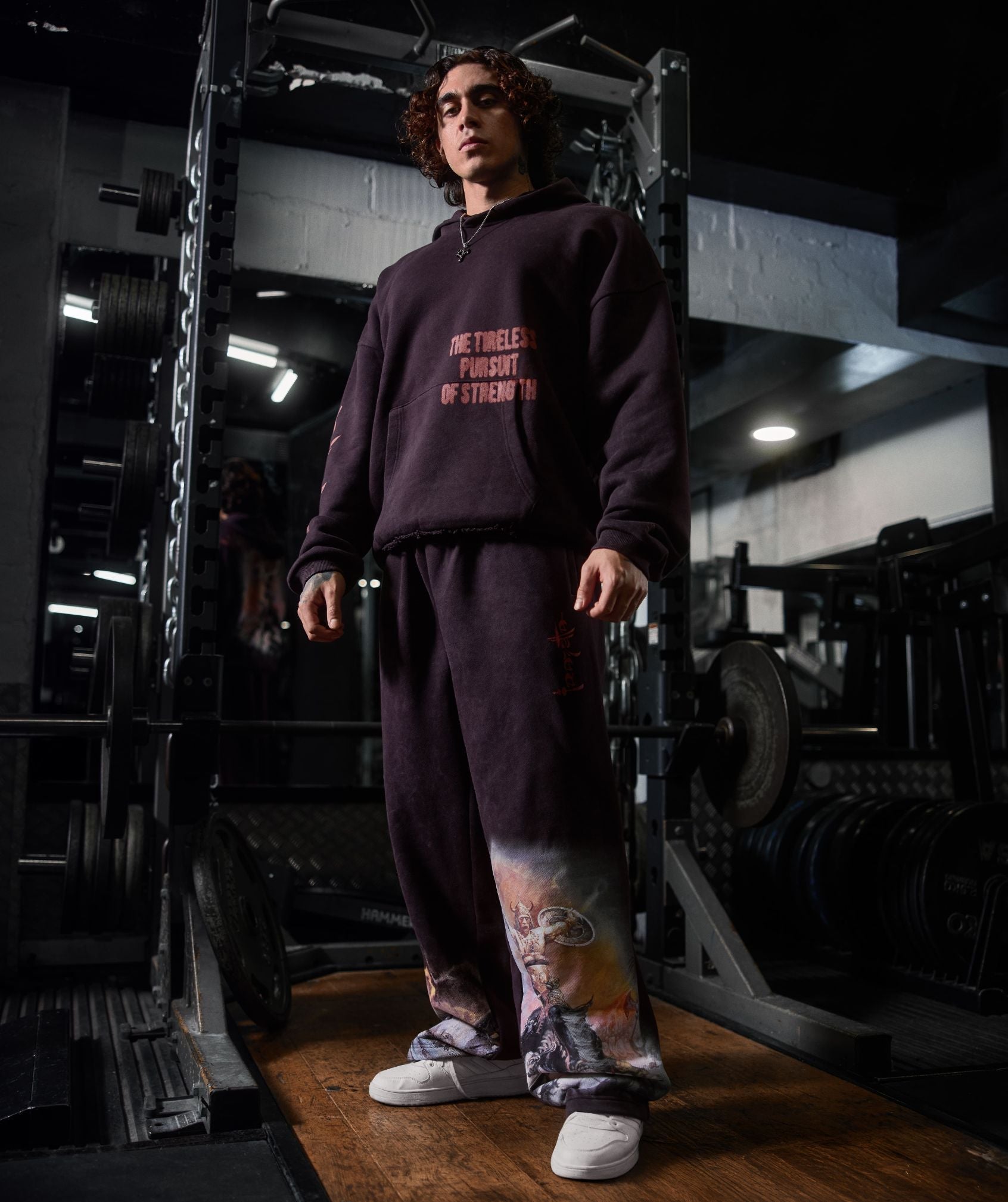 gymshark-frazetta-graphic-hoodie-pullovers-black-aw25