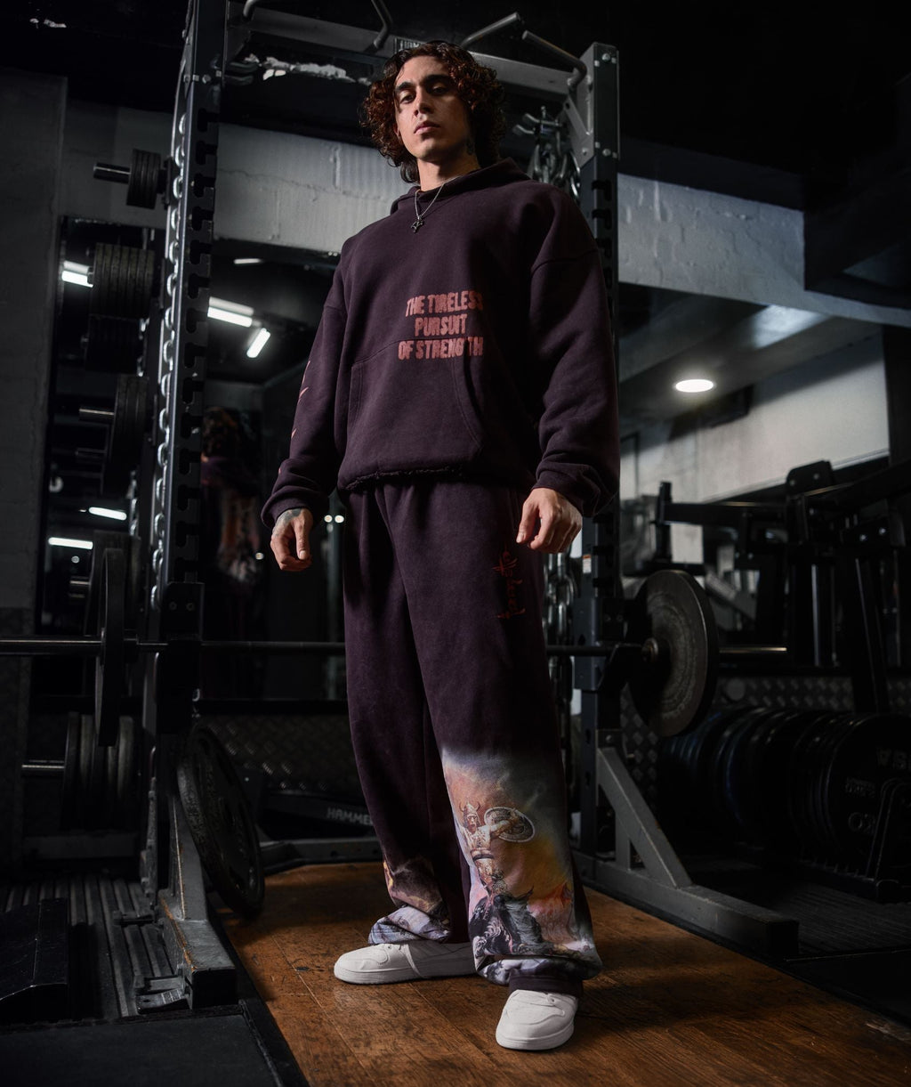 gymshark-frazetta-graphic-jogger-pants-black-aw25